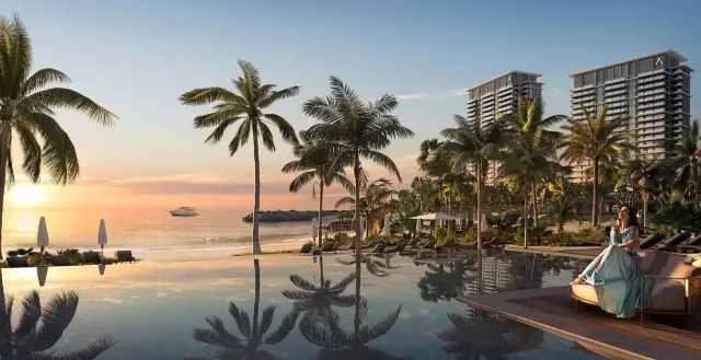 Address Residences Al Marjan Island beachfront towers at sunset