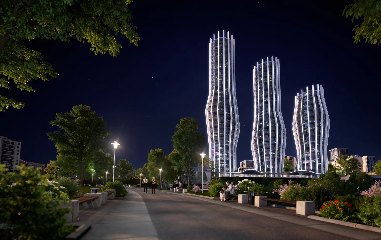 Alliance Highline towers at night from the riverside promenade