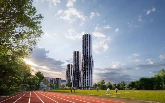 Alliance Highline towers viewed from the sports field at dusk