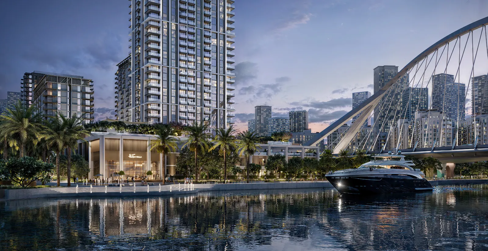 Arlo tower rising above the Dubai Creek Harbour waterfront at dusk, with the arched bridge and a yacht on the canal