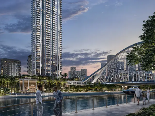Arlo tower exterior above Dubai Creek Harbour promenade at dusk