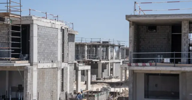 Bay Villas construction site with Dubai skyline in the background