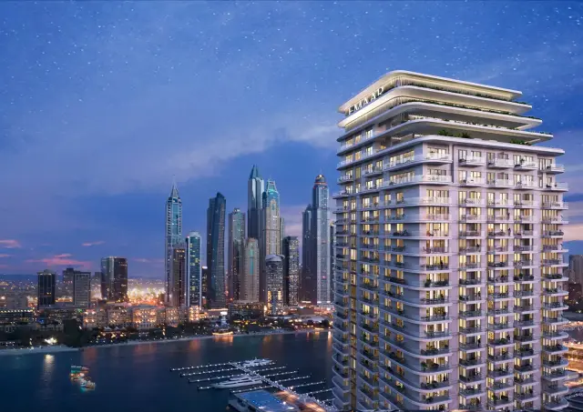 Beachgate by Address tower at night with the Dubai Marina skyline in the background