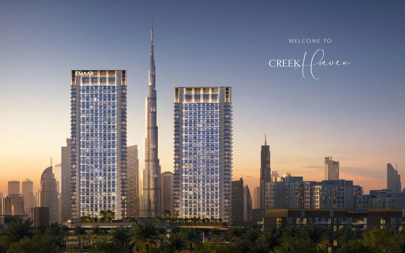 Creek Haven twin towers exterior with Burj Khalifa skyline at dusk
