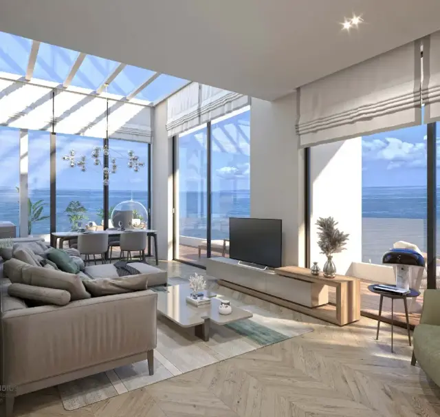Open plan living area with a glass roof and panoramic sea views at Mziuri Gardens