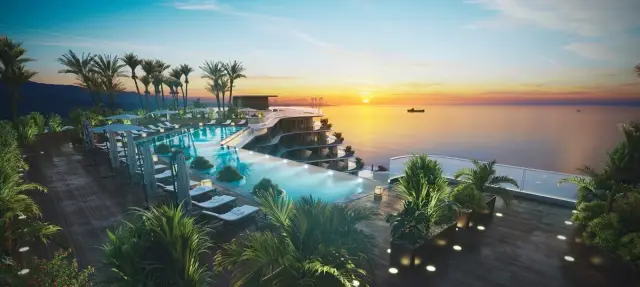 NEXT Collection Batumi infinity pool deck at sunset