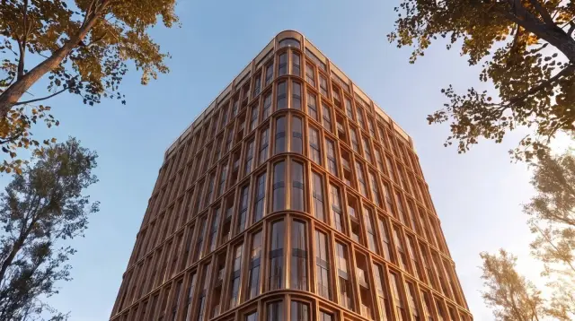 NEXT Gardens tower facade detail, upward angle view with trees