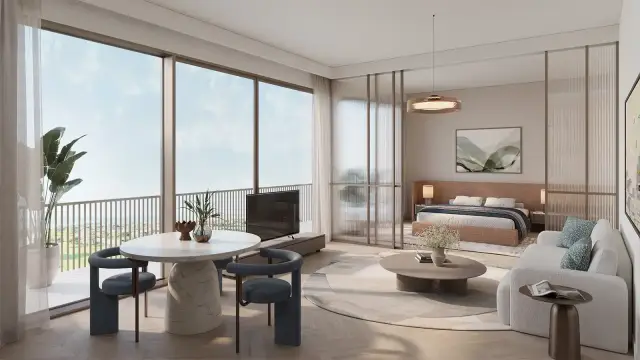 Nura studio living and sleeping area with balcony