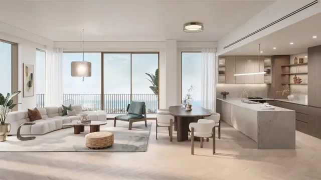 Nura living and dining area with sea-view balcony