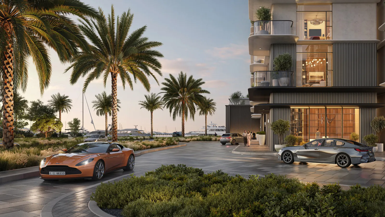 Pier Point residential building and arrival drive lined with palm trees at sunset, Rashid Yachts and Marina