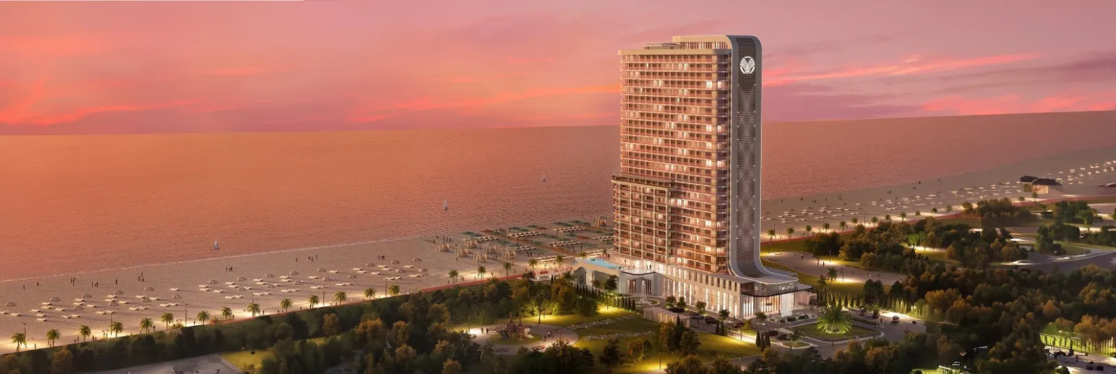 Pontus Rotana Resort & Spa tower exterior above the beach at sunset