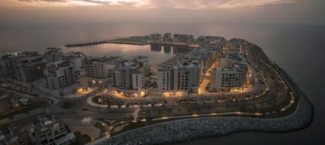 Aerial view of Port de La Mer peninsula at dusk