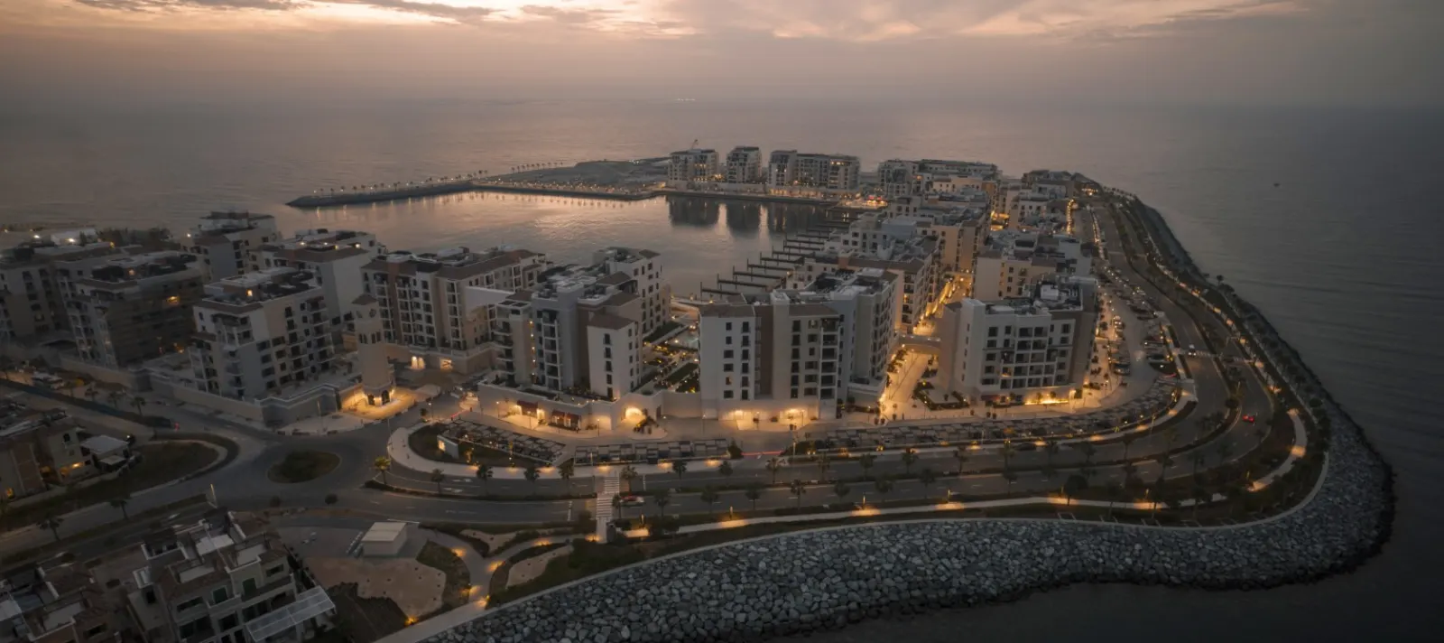 Aerial view of Port de La Mer peninsula at dusk