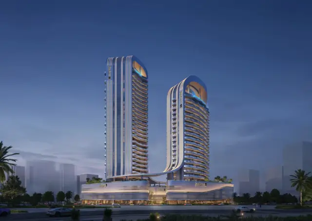 Radisson Blu Hotels RAK Central exterior at night