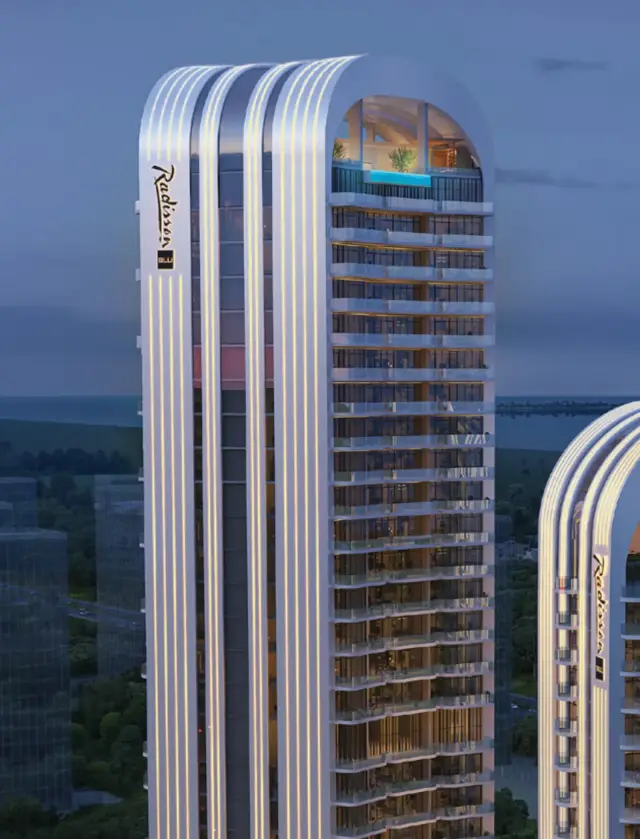 Aerial view of the towers with rooftop pools