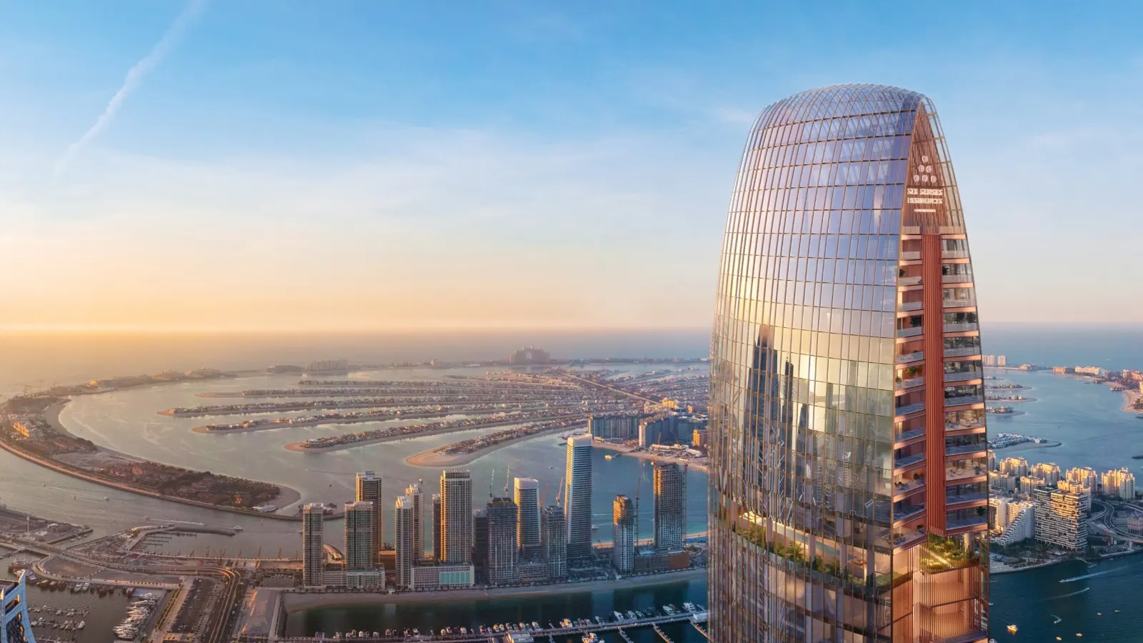 Six Senses Residences Dubai Marina tower exterior above the Palm Jumeirah skyline