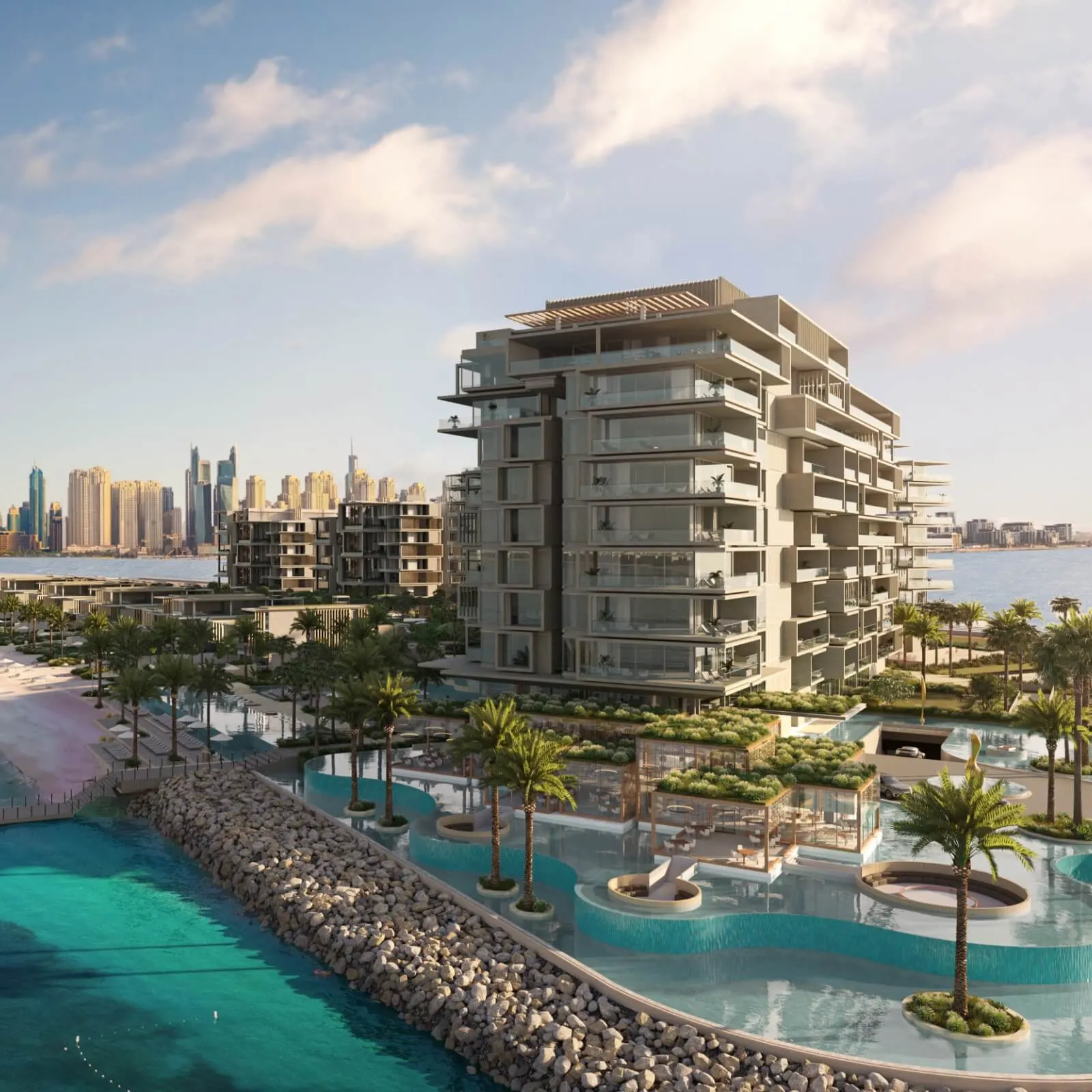 Six Senses Residences The Palm aerial exterior with lagoon pools and Dubai Marina skyline