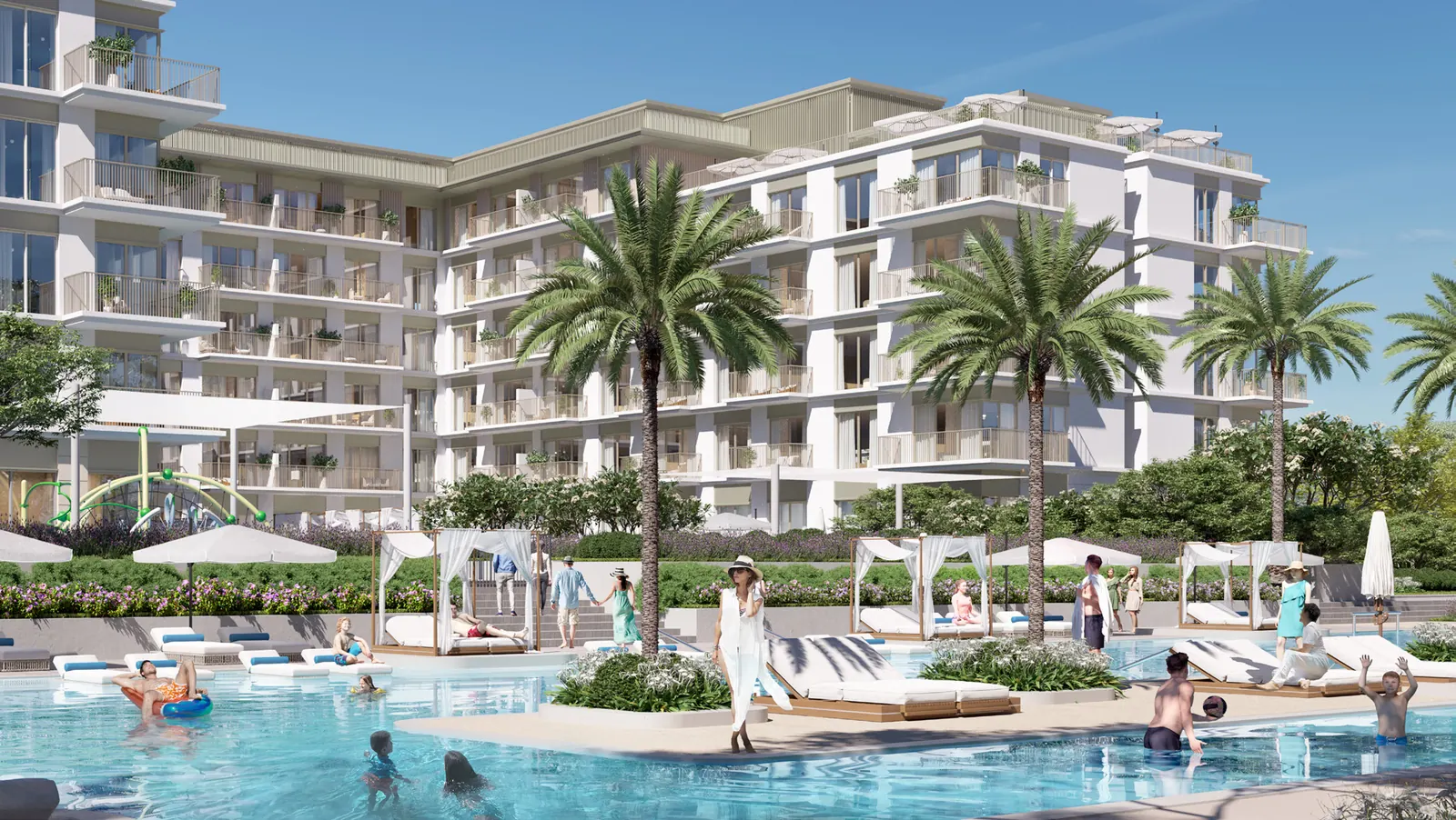 Sunridge residential buildings overlooking the resort style pool and palm garden on a sunny day