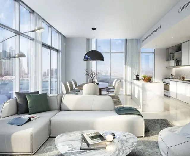 Sunrise Bay open plan living room with floor to ceiling windows and marina views