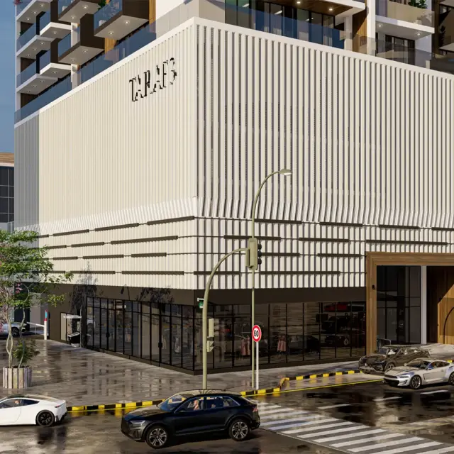 Street level view of the Taraf 3 Residence podium with ground floor retail