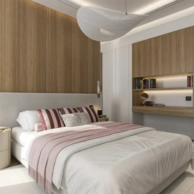 Bedroom in a Taraf 3 Residence apartment with soft natural tones