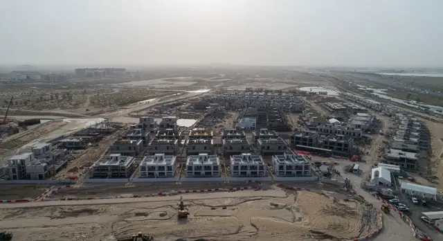 Aerial view of The Pulse Beachfront under construction in Dubai South