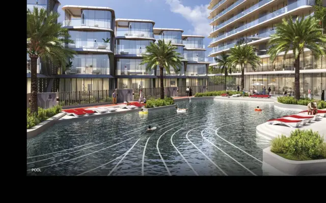 Swimming pool with sun loungers