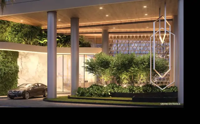 Grand entrance with landscaped porte cochere