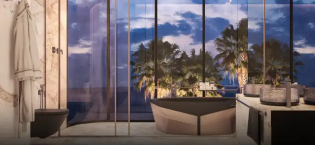 Bathroom with freestanding tub and sea view